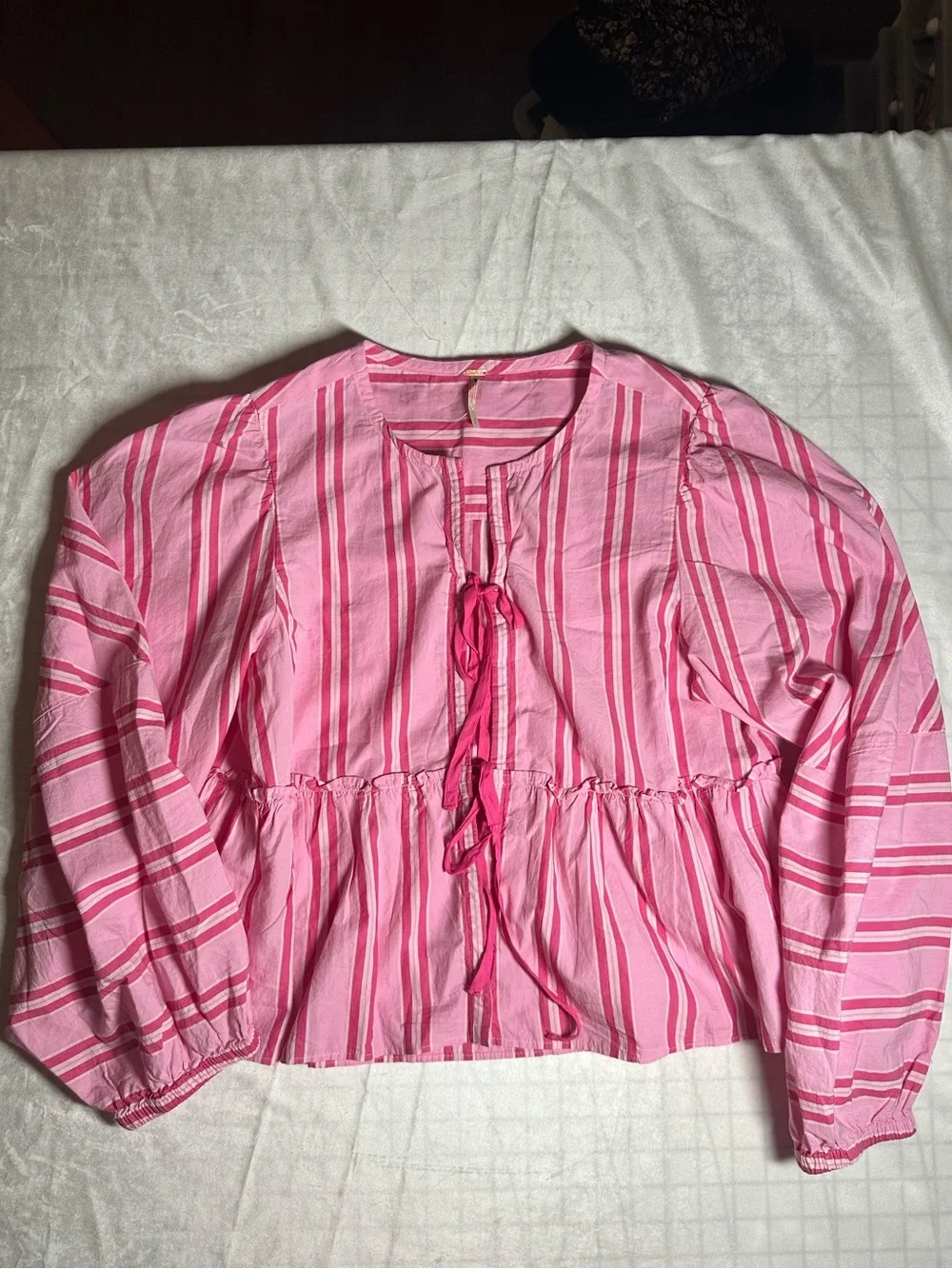 Free People pink peplum tie front Brunch Babe Blouse size small